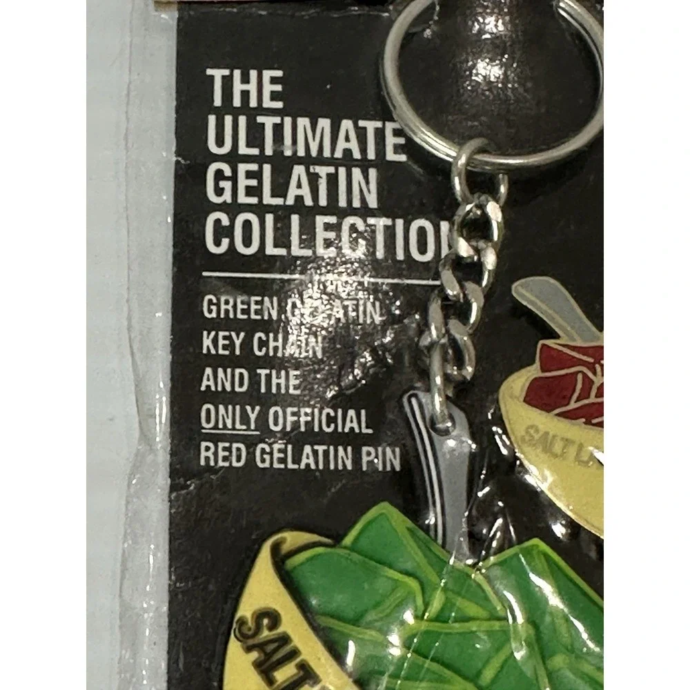 Salt Lake 2002 Olympics Aminco LE 5000 RED /GREEN JELLO KEYCHAIN PIN Set NIP